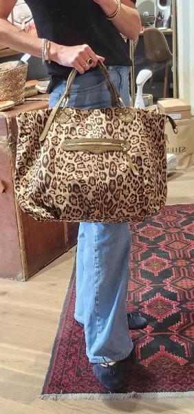 sac mila louise tissu léopard et empiècement de cuir. Très agréable à porter